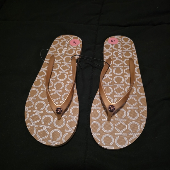 Calvin Klein Shoes - Calvin Klein Tan Logo-Print Thong Sandals